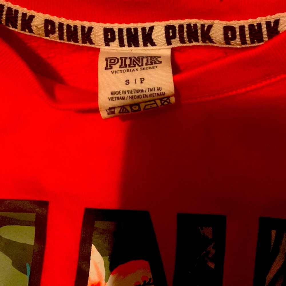 A pink victorious secret sweater